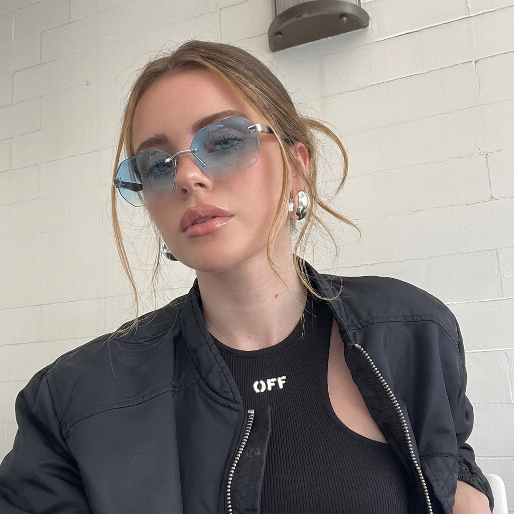 Atlantic Silver Black Rose Gradient rimless polygon sunglasses on model