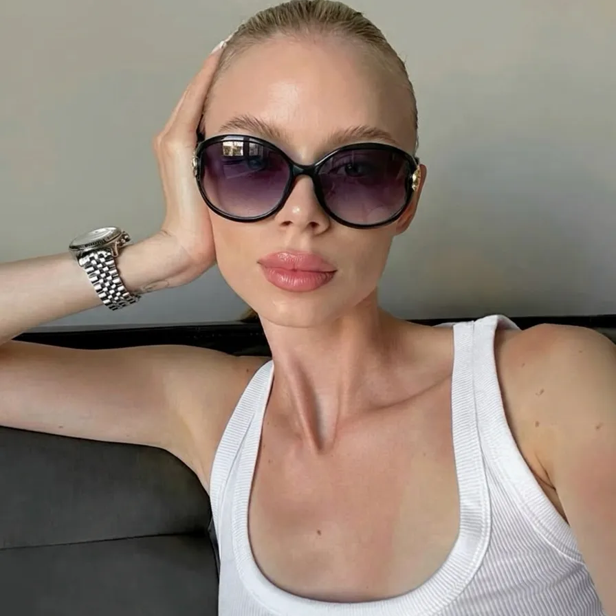 Bold Black Charcoal oversized oval sunglasses on model