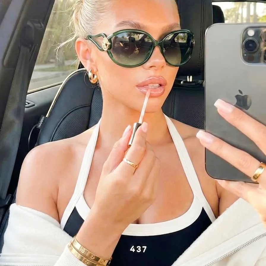 Bold Green Smoke oversized oval sunglasses on model