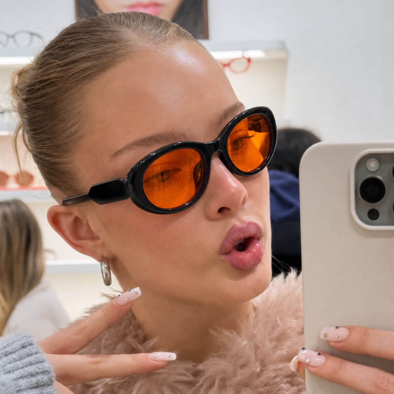 Caelum Black Orange oval sunglasses on model