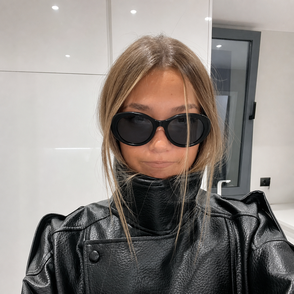 Caelum Black Smoke oval sunglasses on model