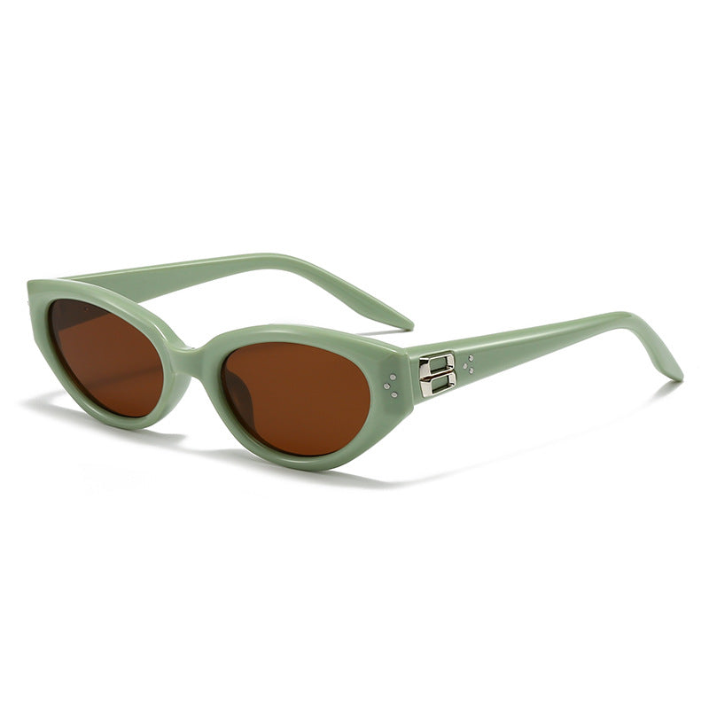 Celeste cat eye sunglasses with mint frame and brown lenses