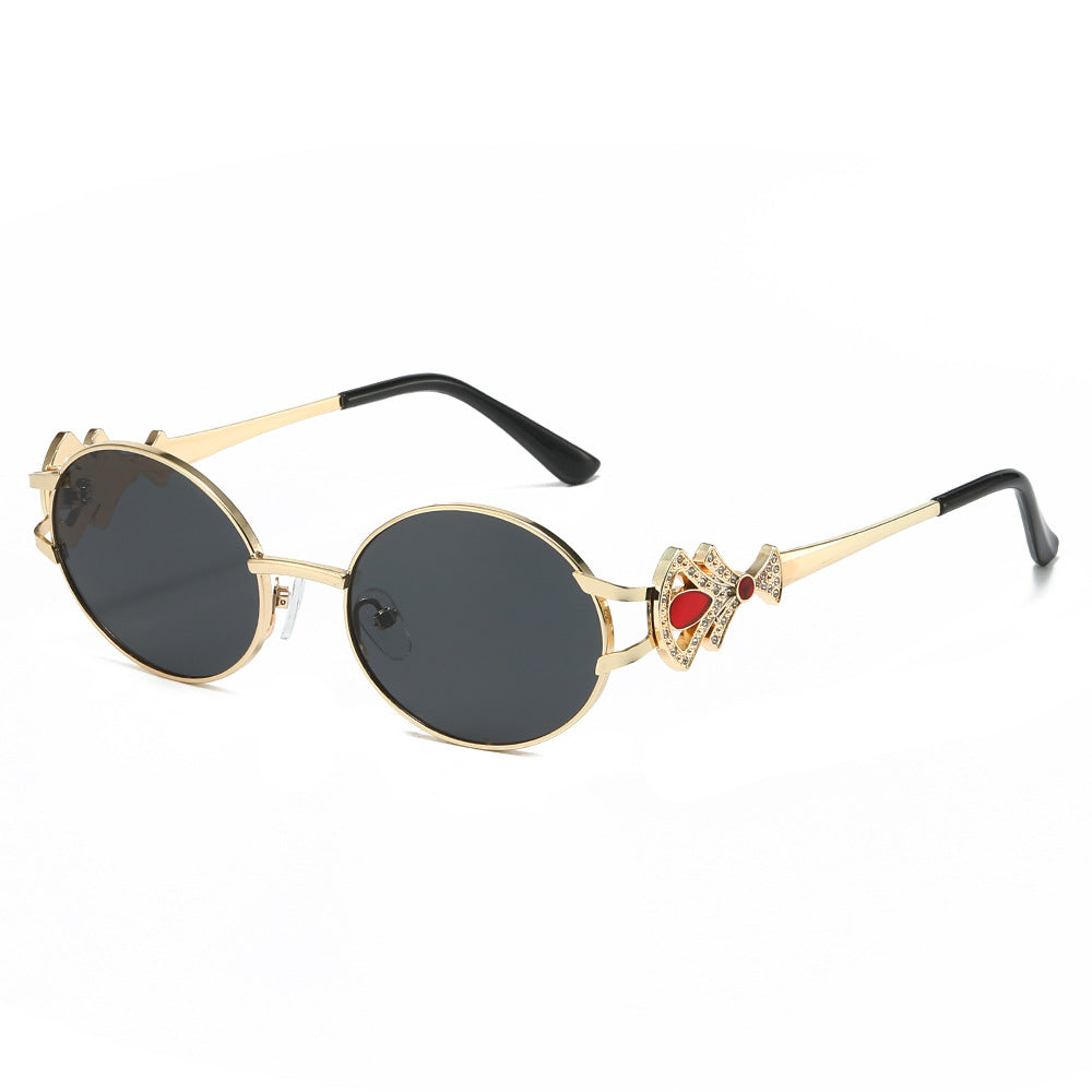 Eos round metal sunglasses in Gold Black