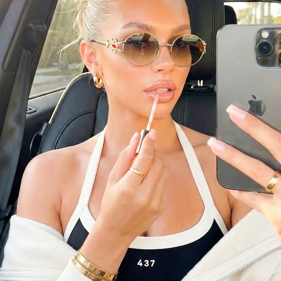 Eos Gold Cream round metal sunglasses on model
