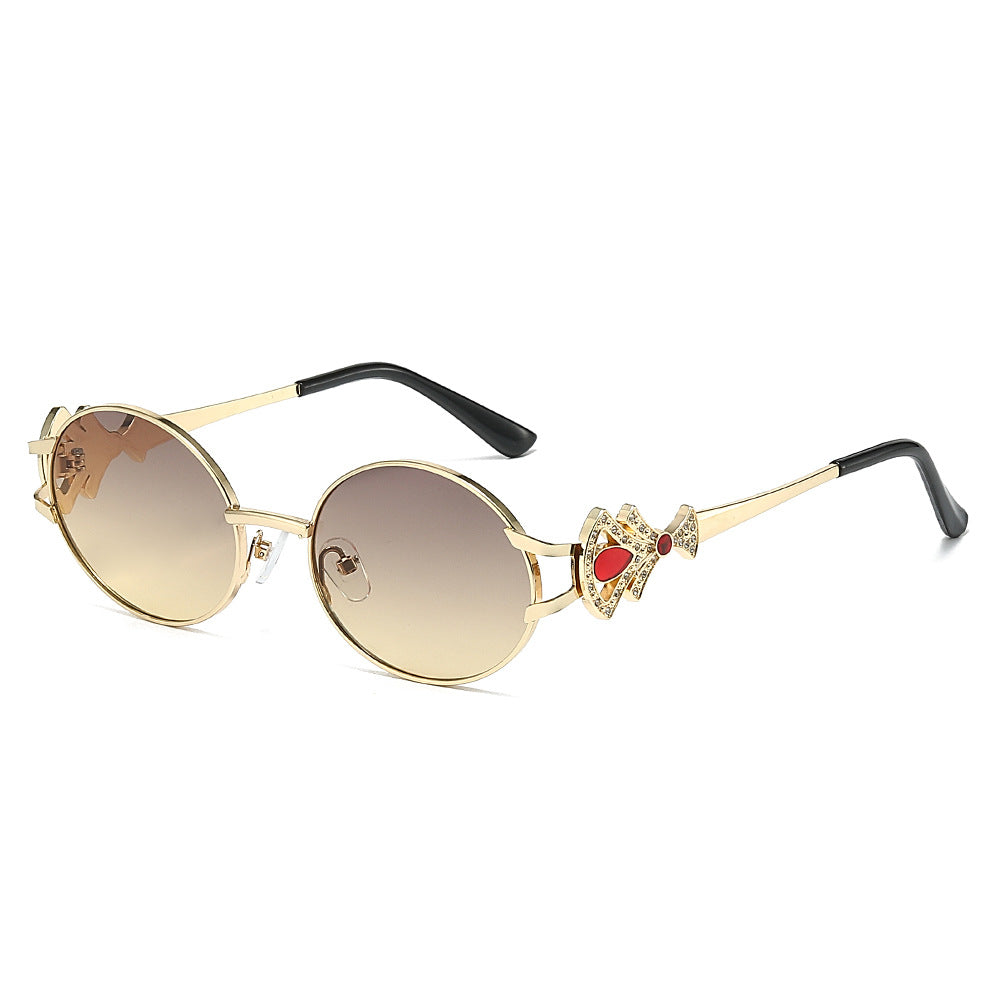 Eos round metal sunglasses in Gold Cream