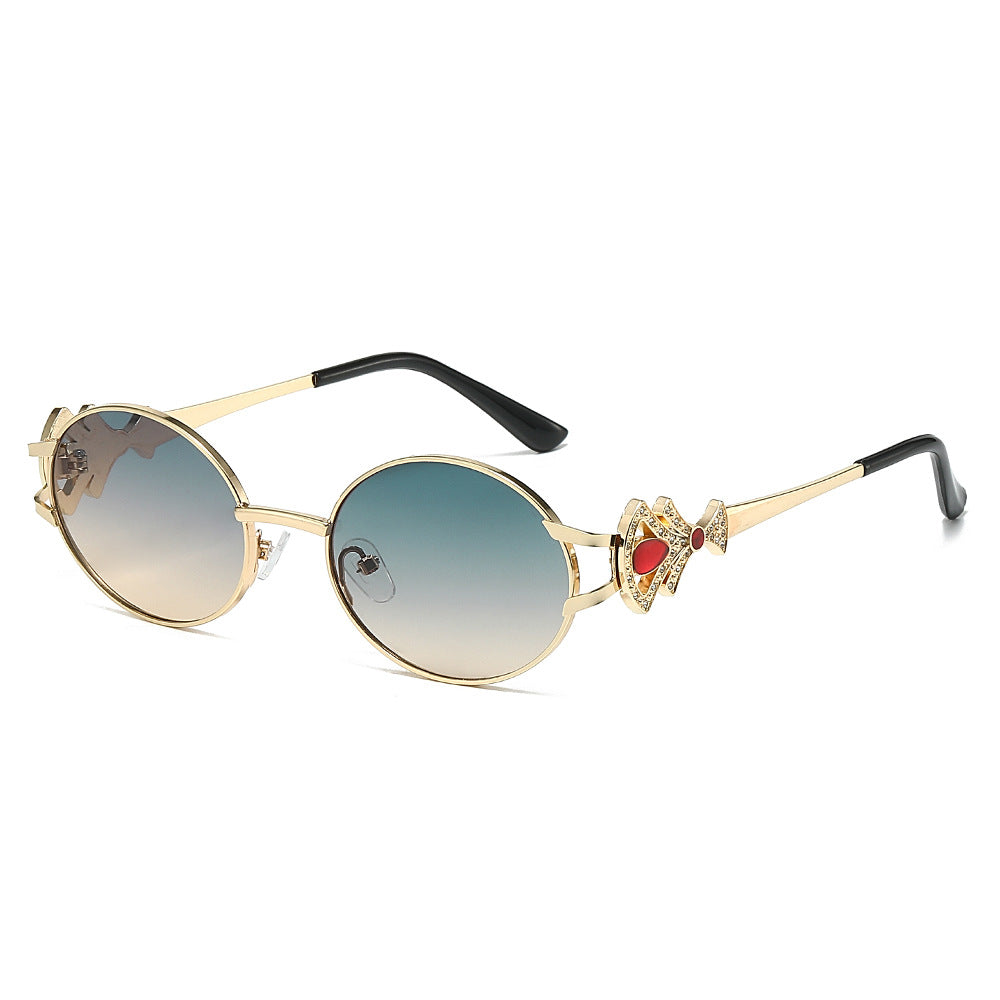 Eos round metal sunglasses in Gold Blue