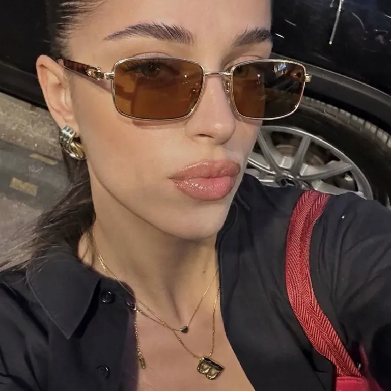 Helios Gold Pink rectangle sunglasses lifestyle view