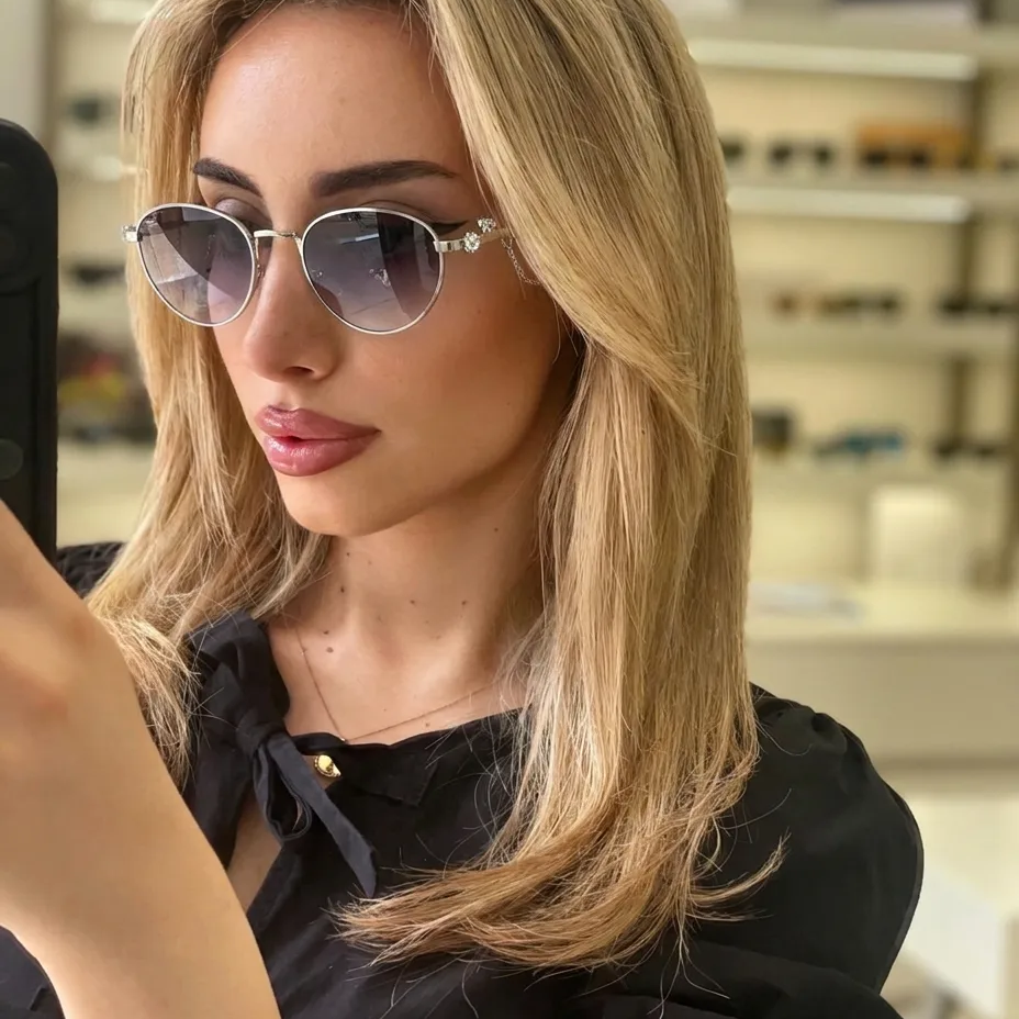 Orion Silver Violet round metal sunglasses on model