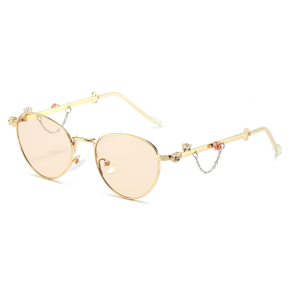 Orion round metal sunglasses in Gold Peach