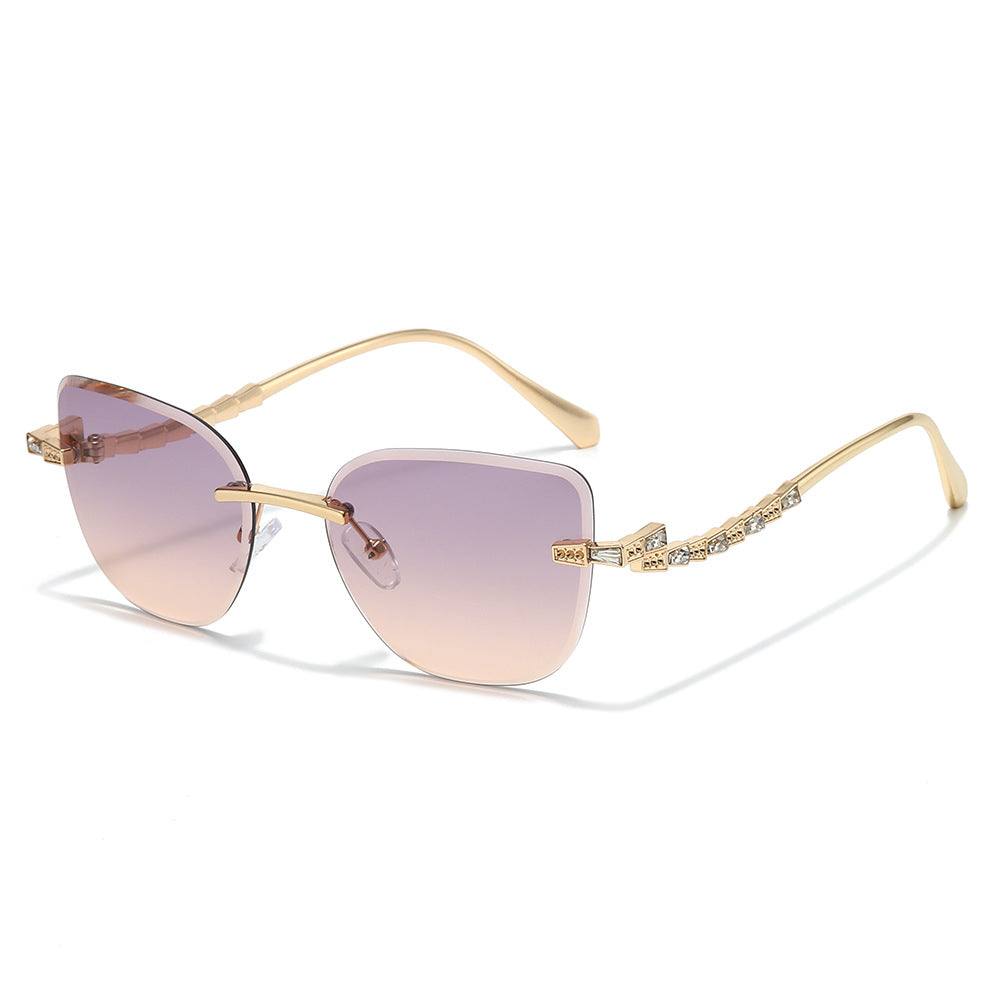 Pelican rimless cat-eye sunglasses in Gold Rose Gradient