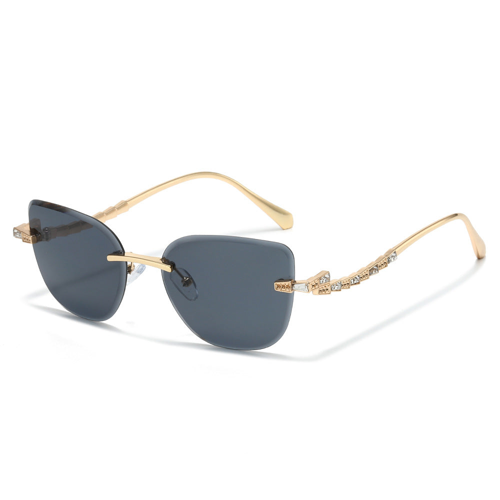 Pelican rimless cat-eye sunglasses in Gold Smoke