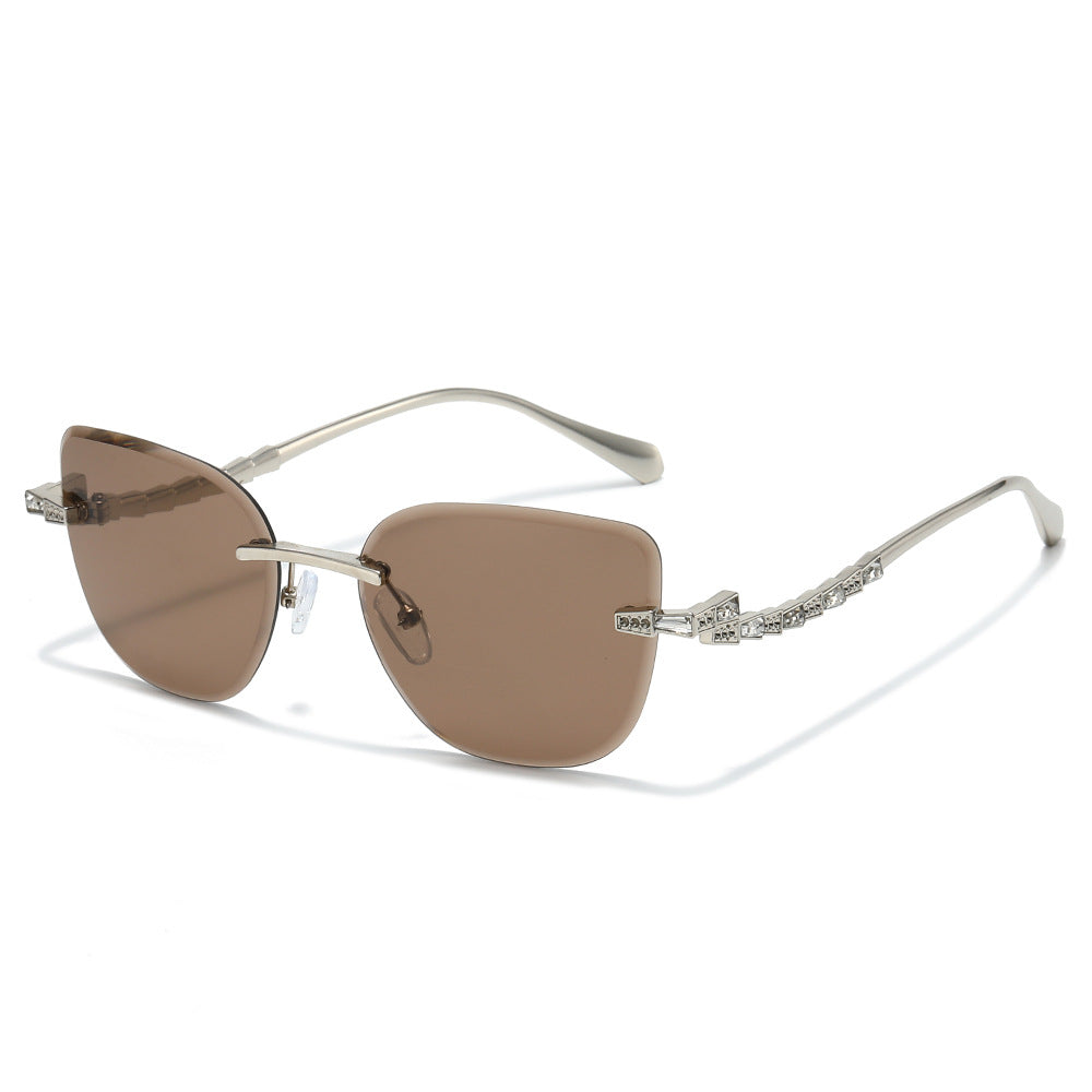 Pelican rimless cat-eye sunglasses in Silver Brown