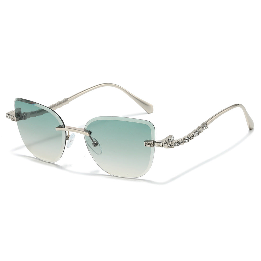 Pelican rimless cat-eye sunglasses in Silver Mint