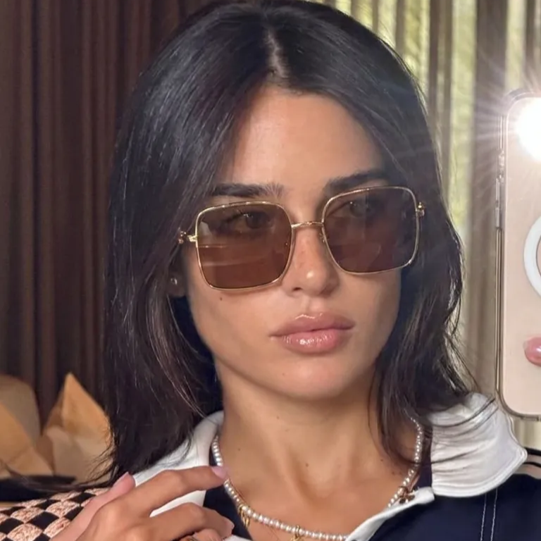 Phoenix Gold Amber square sunglasses lifestyle view