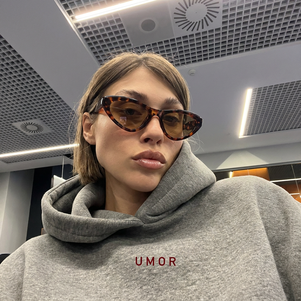 Rayne Tortoise Brown cat-eye sunglasses on model