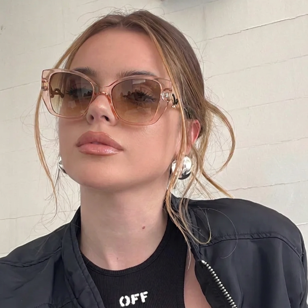 Sage Peach Pink cat-eye sunglasses on model