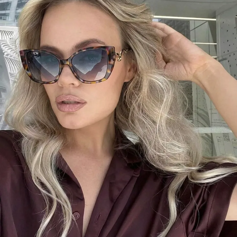Sage Tortoise Brown cat-eye sunglasses on model
