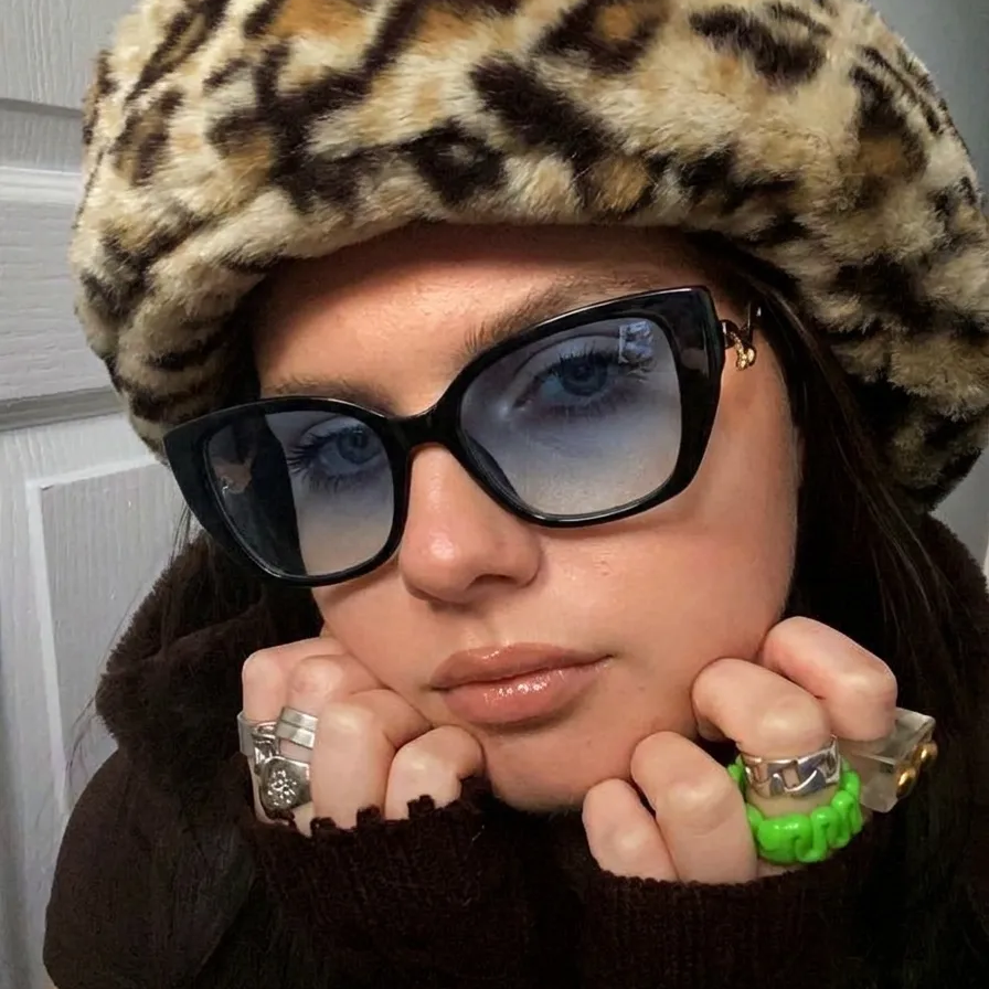 Sage Black Blue cat-eye sunglasses on model