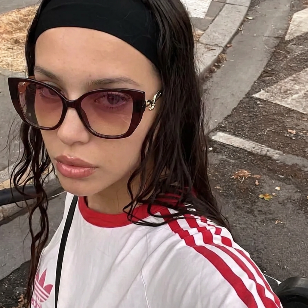 Sage Wine Pink cat-eye sunglasses on model
