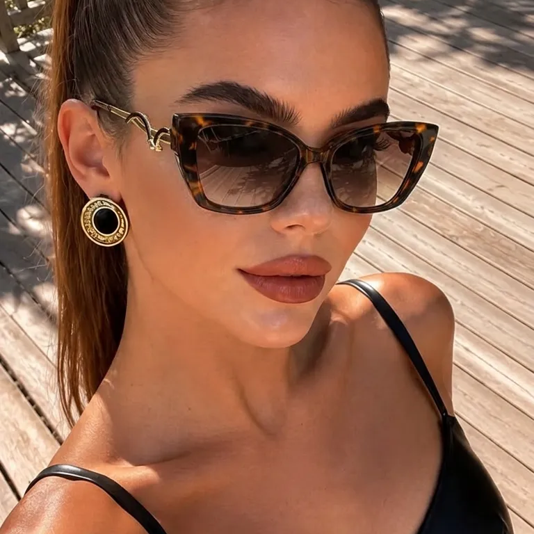 Sage Colorful Tortoise cat-eye sunglasses on model