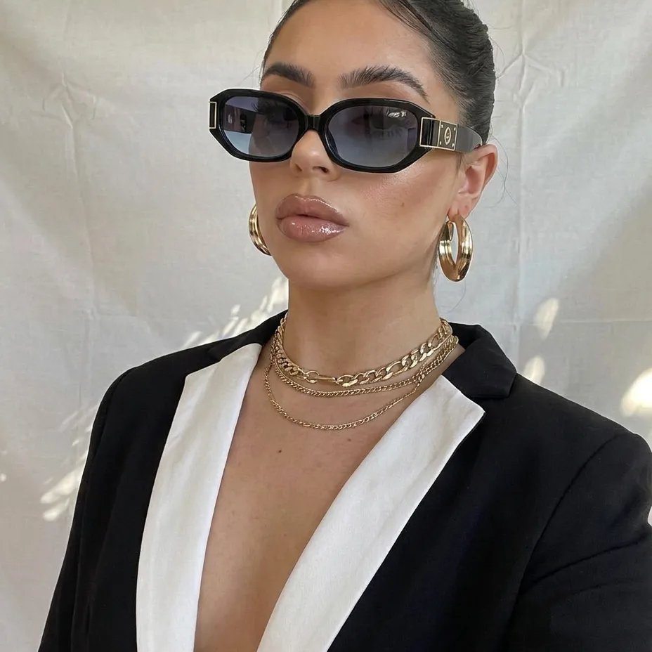 Stellar Black Pink Gradient hexagon sunglasses on model