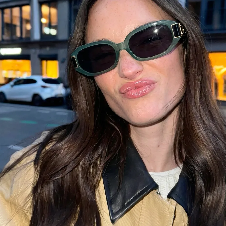 Stellar Gray Green hexagon sunglasses on model