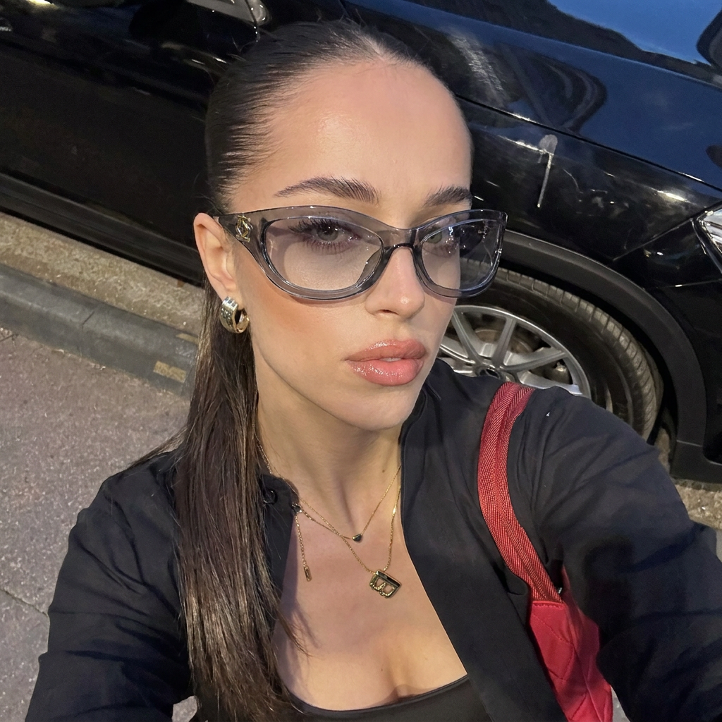Sterling Transparent Gray Purple cat-eye sunglasses on model