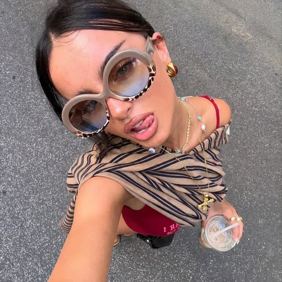 Tide Beige Tortoise oversized oval sunglasses lifestyle view