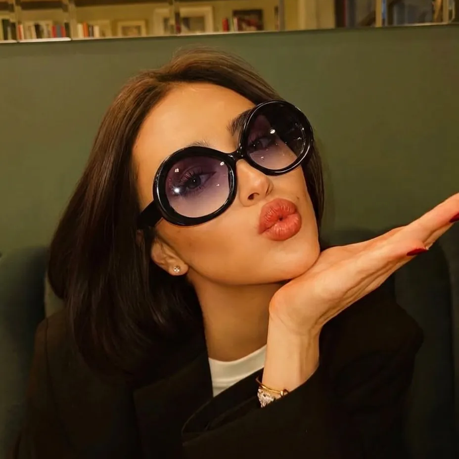 Tide Black oversized oval sunglasses lifestyle view
