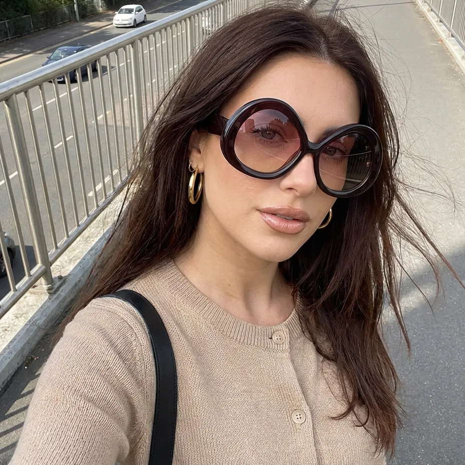 Tide Deep Brown oversized oval sunglasses lifestyle view