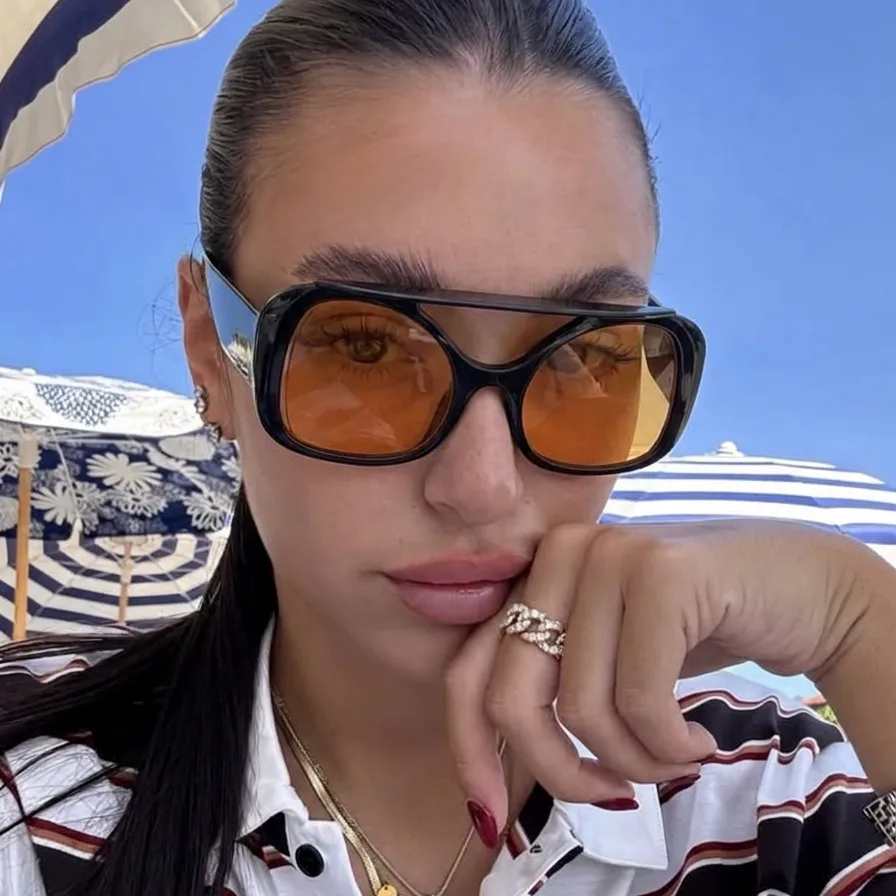 Titan Black Orange aviator sunglasses on model