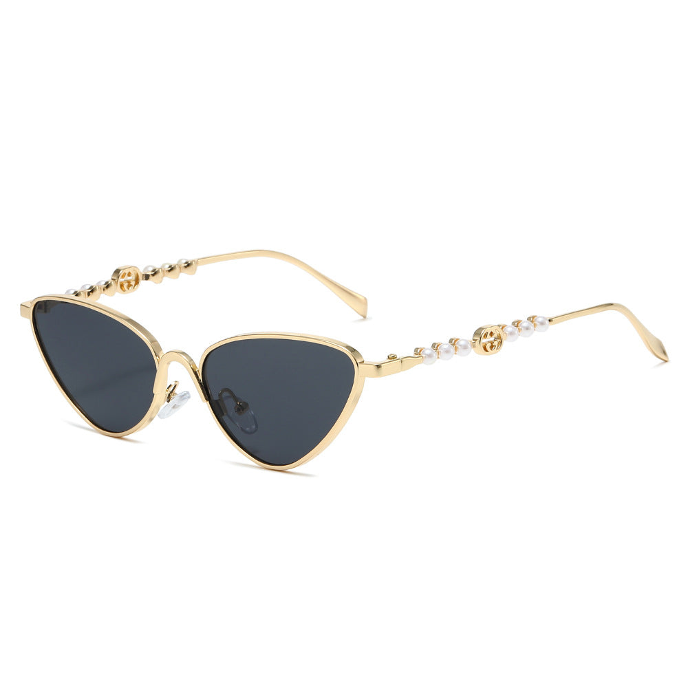 Tropic cat-eye sunglasses in Gold Smoke