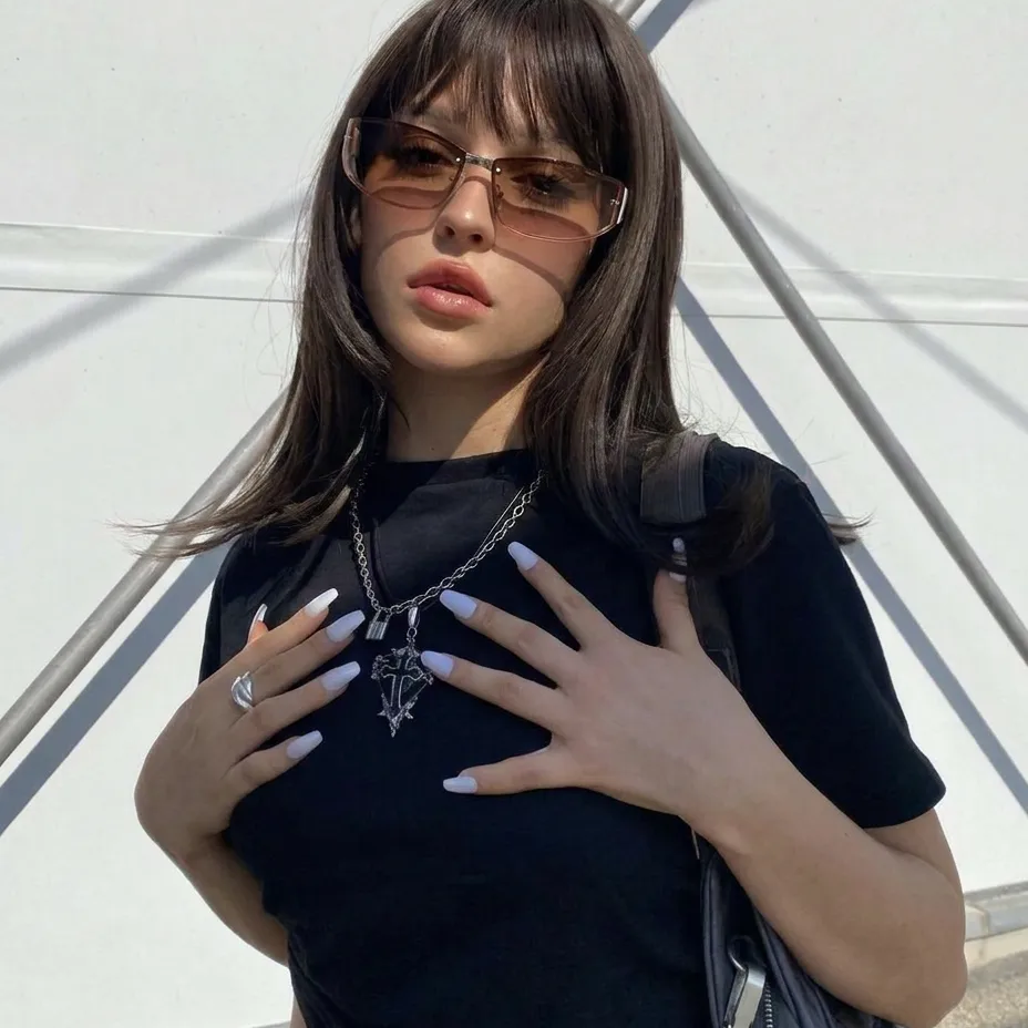 Vibe rose white sunglasses on model