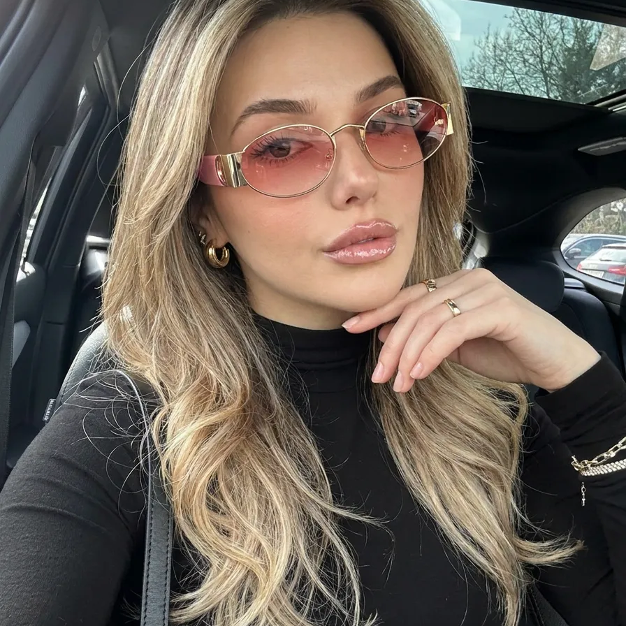Zephyr Gold Pink oval sunglasses on model